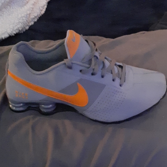 gray and orange nike shox